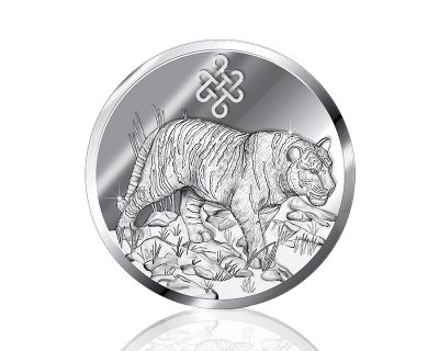Небольшая серебряная монета с тигром